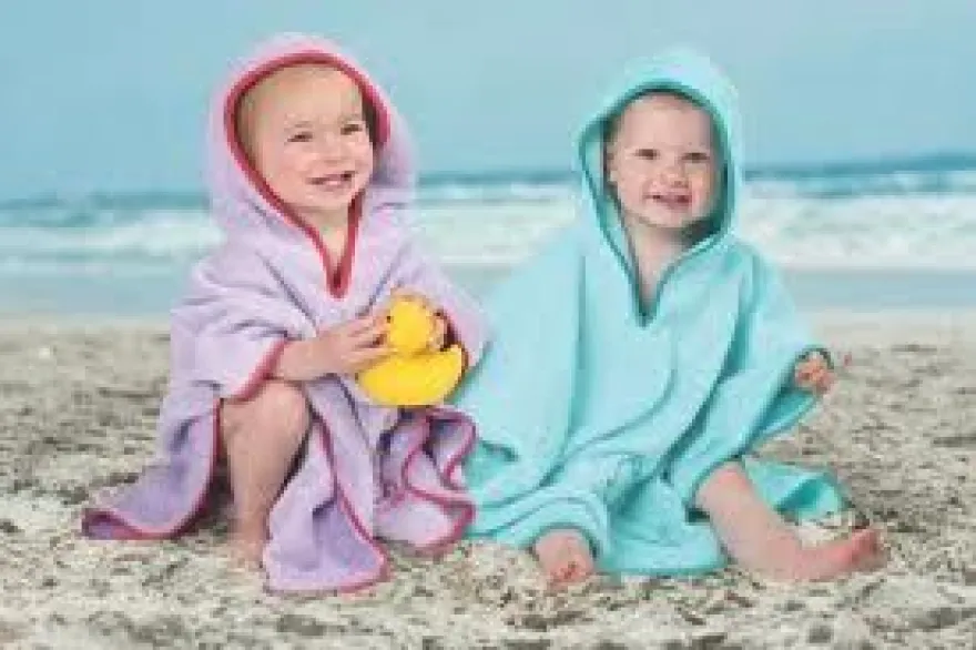 Cuddledry Poncho mit Sonnenschutz flieder mit Anlgerfisch