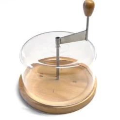 Käse Theke Ole Friedel Set Tete de Moine Kaese halber Laib und abgerundete Haube