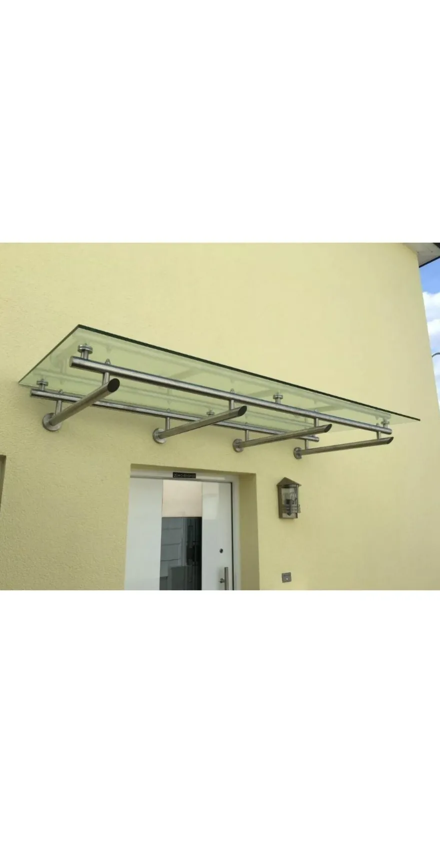 Vordach aus Edelstahl Modell Elegance mit VSG-TVG Türvordach Wetterschutz Überdachung