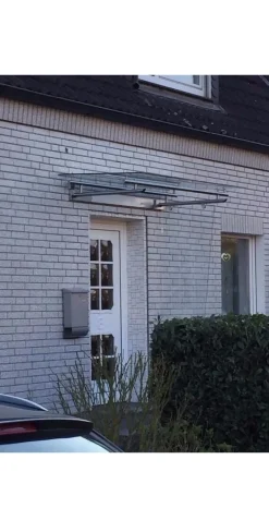 Vordach aus Edelstahl Modell Elegance mit VSG-TVG Türvordach Wetterschutz Überdachung